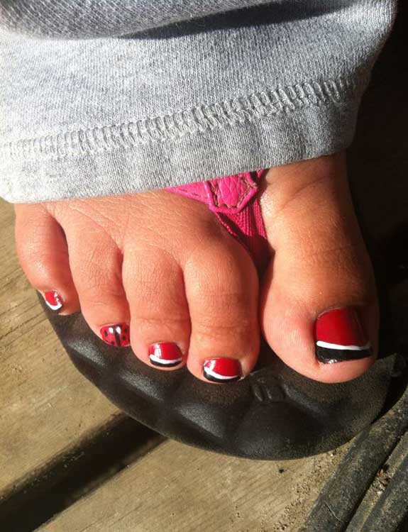 Red Toe Nails with black Tips