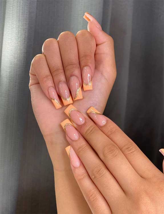 Shining-Golden-Stripes-on-a-French-Tip-Manicure