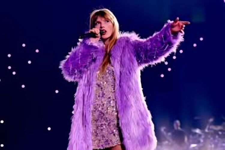 A glamorous floating purple halter gown with a voluminous skirt.