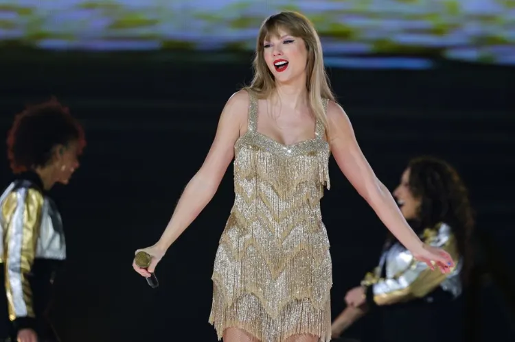 Close-up of Taylor Swift in her iconic gold fringe dress
