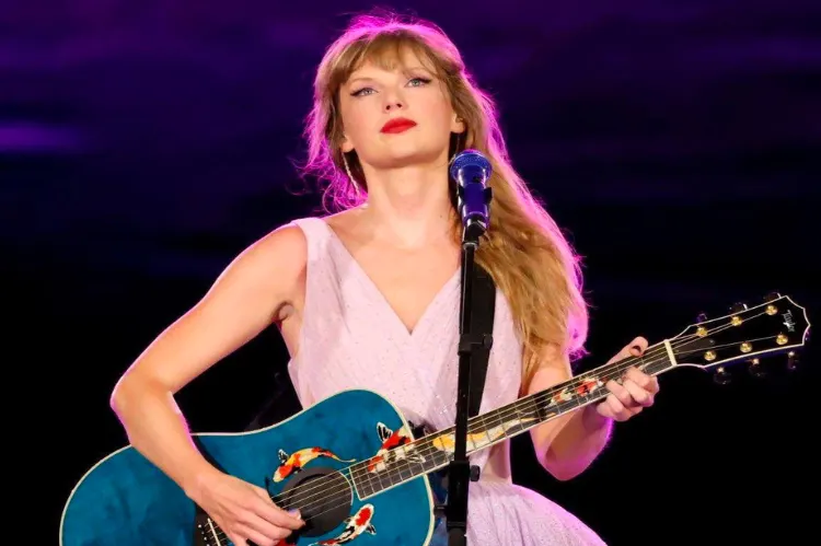 Taylor Swift sitting on a stool with her acoustic guitar